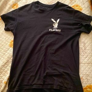 Black medium sized playboy shirt.